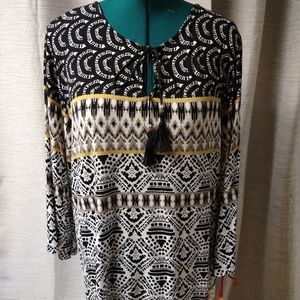 Tunic length multi pattern shirt.